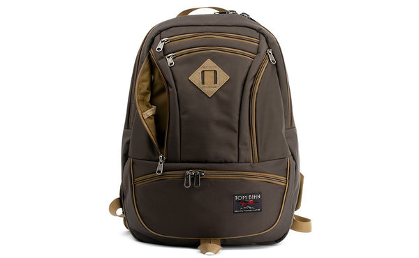 The Guide's Edition Synapse 25 with a pocket open to show the Coyote (brown) 210 Ballistic interior.